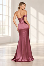 Back view of a mauve rose fitted prom dress with a low lace-up corset back, single draped sleeve, and gently flared floor-length skirt.