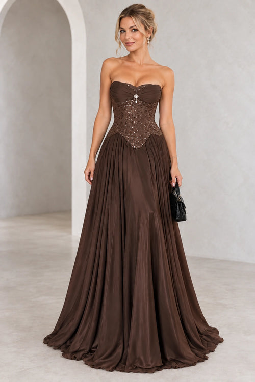 Elegant chocolate brown chiffon prom dress front view featuring a sweetheart neckline, ruched bust, beaded corset, pointed Basque waist and long A-line skirt
