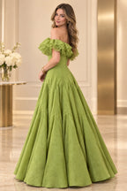 Side and partial back view of a sage green satin prom gown with romantic off-the-shoulder ruffles, fitted waist, and voluminous A-line skirt.