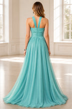 Back view of GraceProm aqua halter wedding guest dress with ruched waist and zipper closure