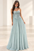 Pale blue Graceprom chiffon wedding guest dress with a beaded sweetheart bodice, pointed basque waist, floor-length A-line skirt and neck scarf.