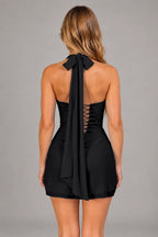 Black mini homecoming dress with halter bow and lace-up corset open back by Graceprom