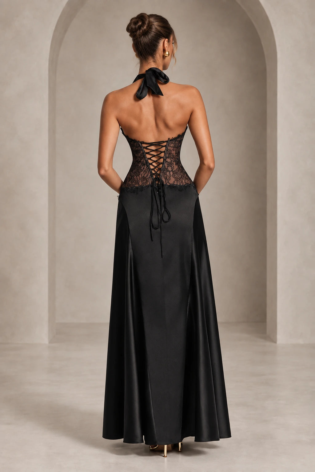 Black open back lace up wedding guest dress with long skirt back view