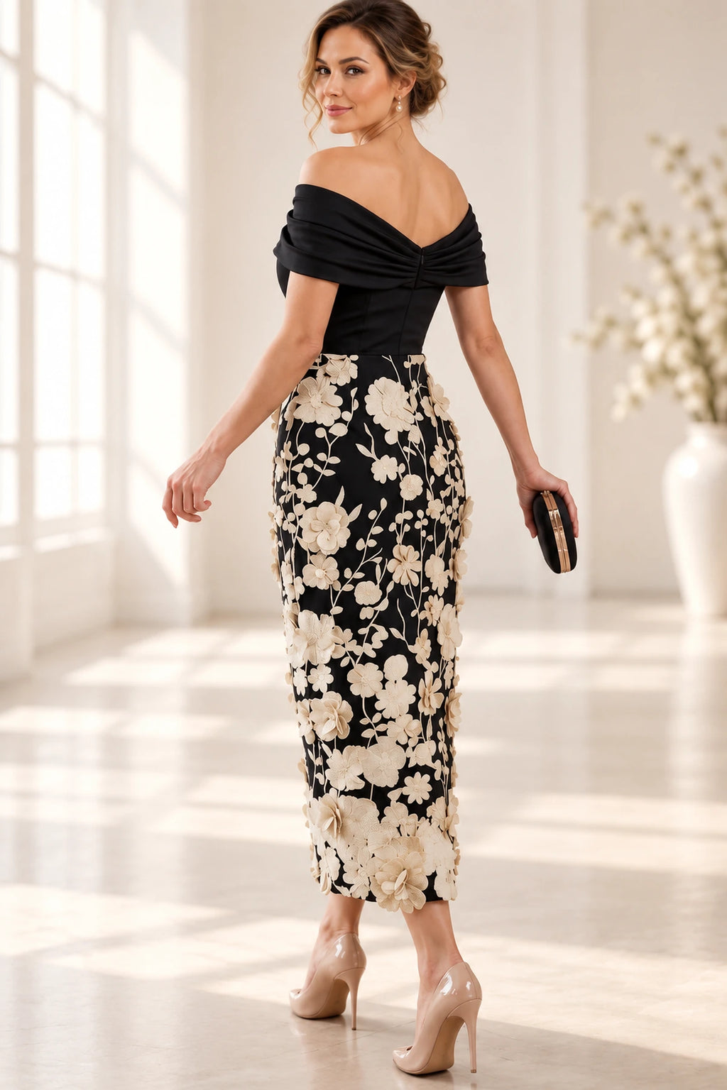 Black and ivory floral Mother of the Bride Dress with draped off-the-shoulder back and fitted silhouette