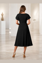 Vedress black mother of the bride dress with flutter sleeves zipper back and midi A-line skirt back view