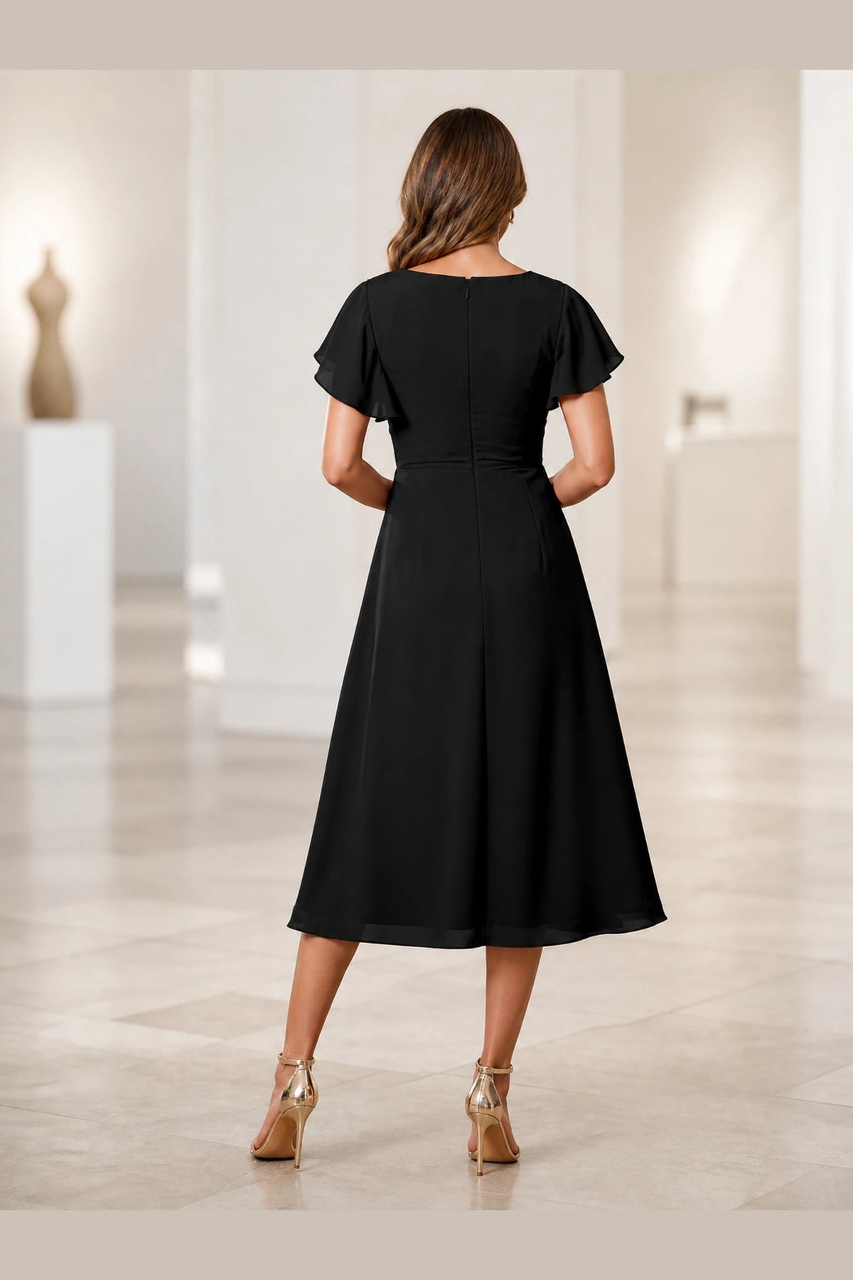 Vedress black mother of the bride dress with flutter sleeves zipper back and midi A-line skirt back view