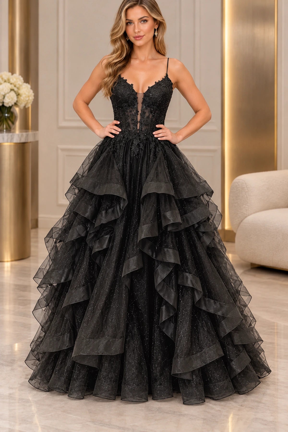 Black ball gown prom dress featuring a plunging V-neckline, spaghetti straps, floral lace illusion corset bodice, and layered ruffle tulle skirt.