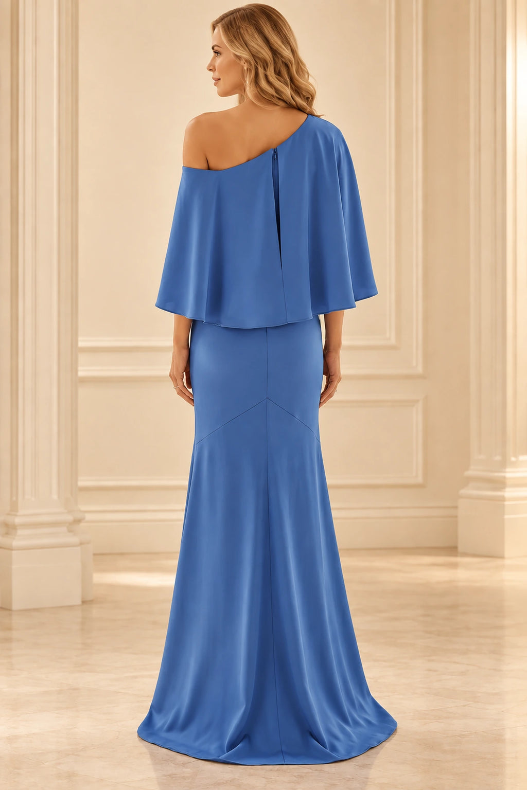 Back view of blue Mother of the Bride Dress with asymmetrical cape overlay, center zipper and flared floor-length hem