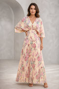Blush floral mother of the bride dress with V-neckline, flutter sleeves, defined waist and flowing floor-length A-line skirt