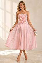 Blush pink strapless 3D floral A-line midi wedding guest dress front view