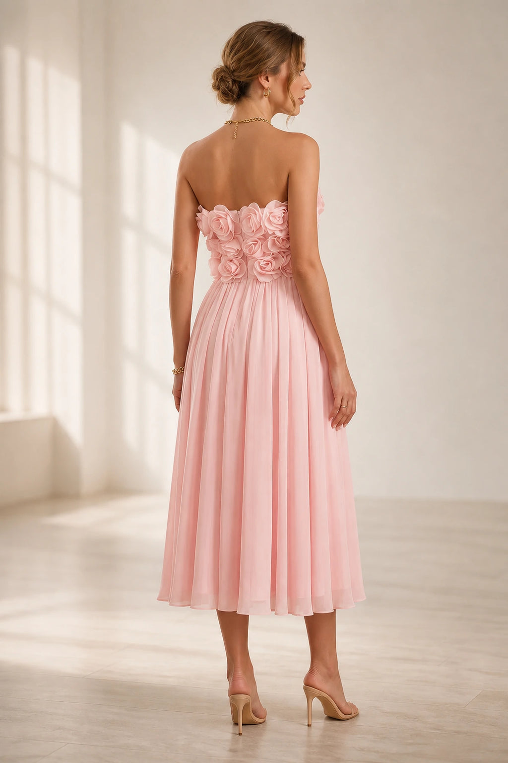 Blush pink strapless 3D floral midi wedding guest dress back view