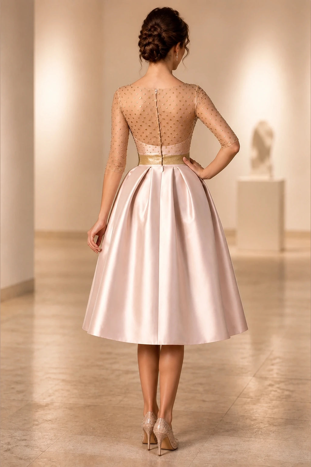 Back view of GraceProm blush pink midi wedding guest dress with sheer embellished top and zipper closure