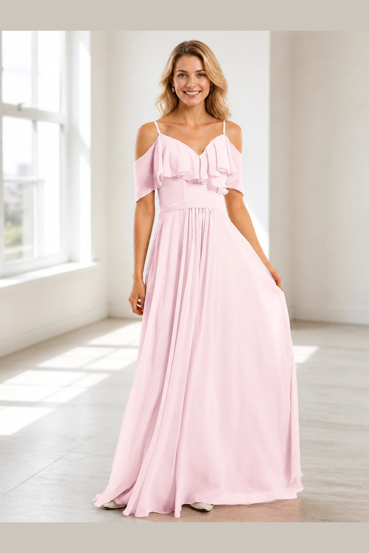 Vedress blush pink prom dress with V-neck cold shoulder ruffle detail and flowing floor-length A-line skirt front view