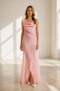 GraceProm blush pink wedding guest dress with cowl neckline draped shoulder detail and floor length skirt