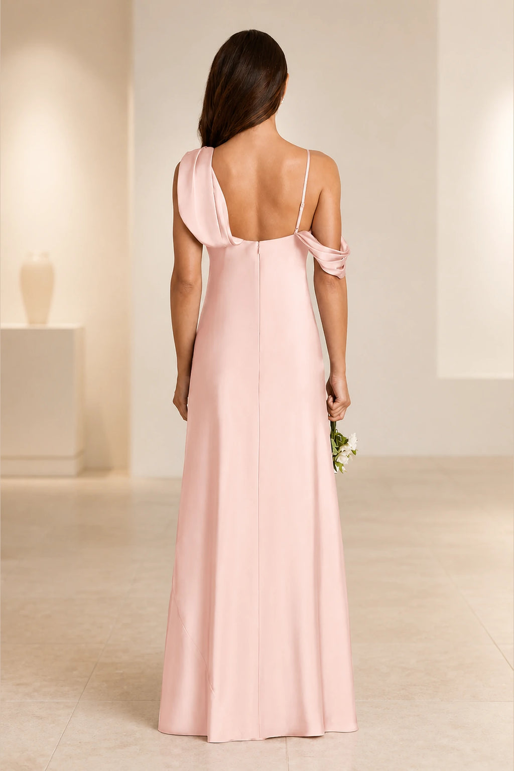 Blush pink bridesmaid dress with asymmetric draped neckline, sleeveless design, open back and floor-length column silhouette, front and back view