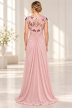Blush pink Mother of the Bride Dress with floral illusion keyhole back, cap sleeves and softly gathered floor length skirt