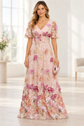 Blush pink mother of the bride dress with floral embroidery and short sleeves
