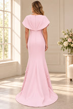 Back view of blush pink mermaid Mother of the Bride Dress with cape detail and center zipper