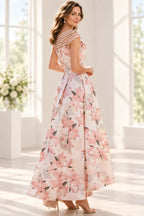 Back view of blush pink floral Mother of the Bride Dress with sheer striped neckline and A-line skirt