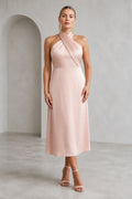 Blush pink halter neck sleeveless A-line midi wedding guest dress front view