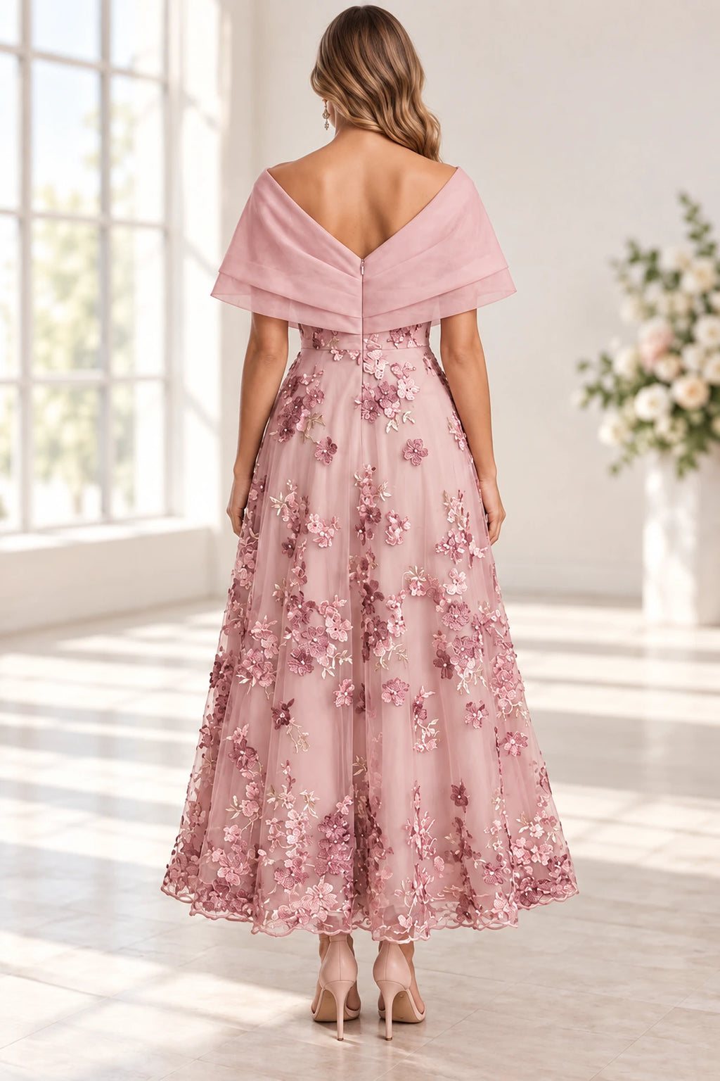 Blush pink Mother of the Bride Dress with V-back, zipper closure and floral appliqué skirt