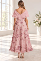 Blush pink Mother of the Bride Dress with V-back, zipper closure and floral appliqué skirt