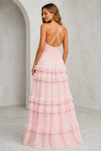 Back view of blush pink bridesmaid dress with crisscross spaghetti straps, open back and tiered ruffle A-line skirt