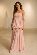 Blush pink strapless ruched A-line long bridesmaid dress with pleated skirt