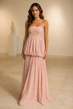 Blush pink strapless ruched A-line long bridesmaid dress with pleated skirt
