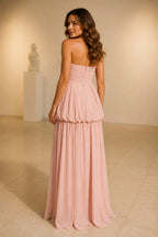 Blush pink strapless ruched A-line long bridesmaid dress with pleated skirt