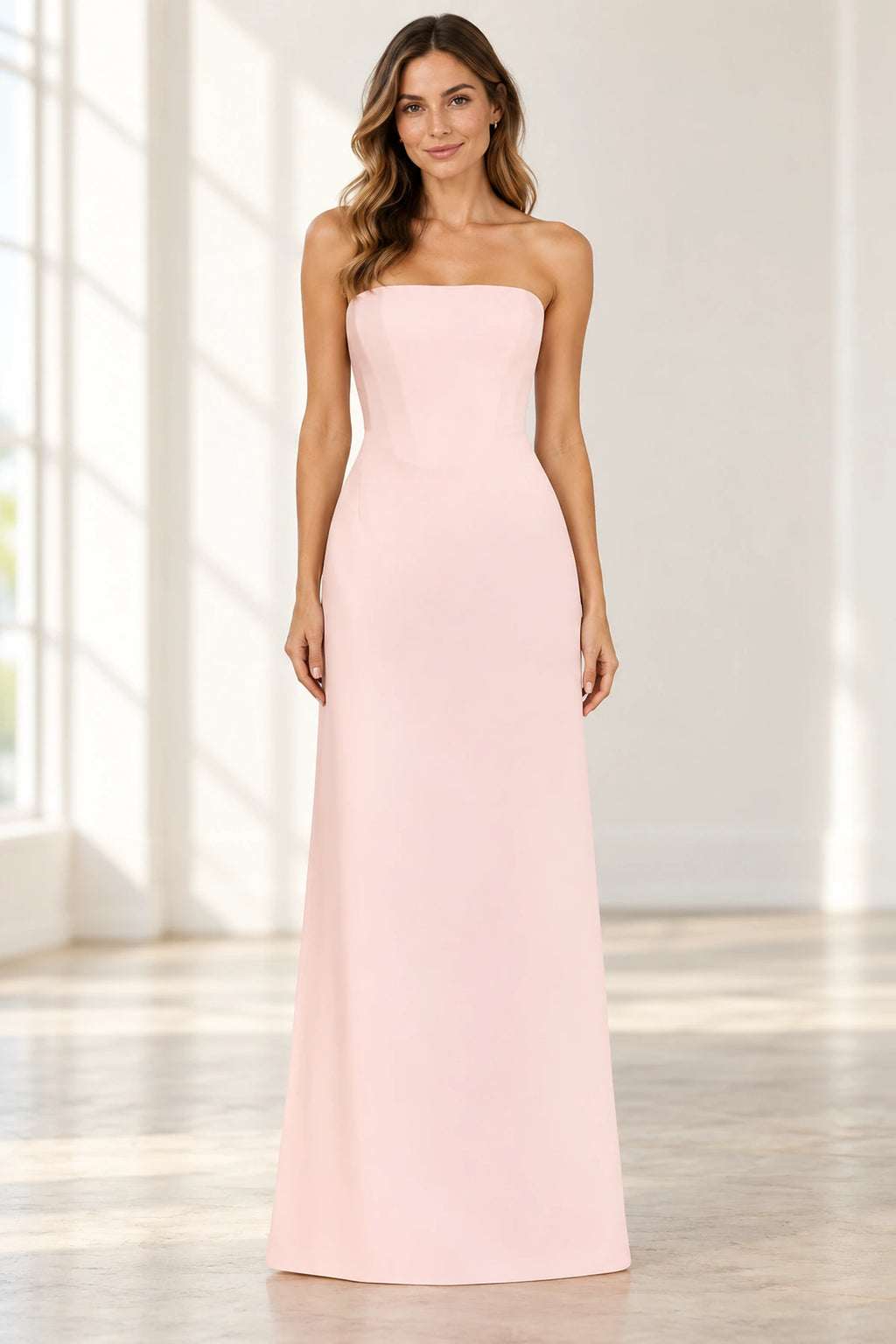 Blush pink strapless A-line wedding guest dress with corset waist by Graceprom