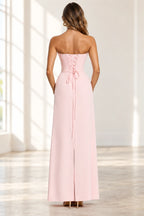 Blush pink floor length formal gown with lace up corset back detail