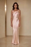 GraceProm blush satin wedding guest dress with cowl neckline sleeveless sheath silhouette and floor length hem
