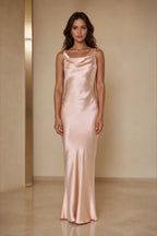 GraceProm blush satin wedding guest dress with cowl neckline sleeveless sheath silhouette and floor length hem