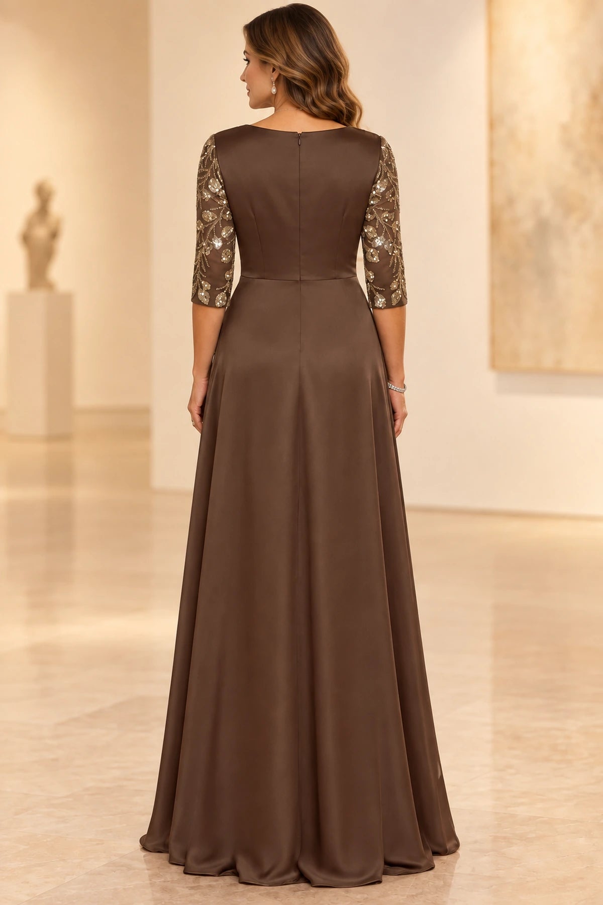 Brown Mother of the Bride Dress with embellished three-quarter sleeves, clean fitted back, center zipper and floor length A-line skirt