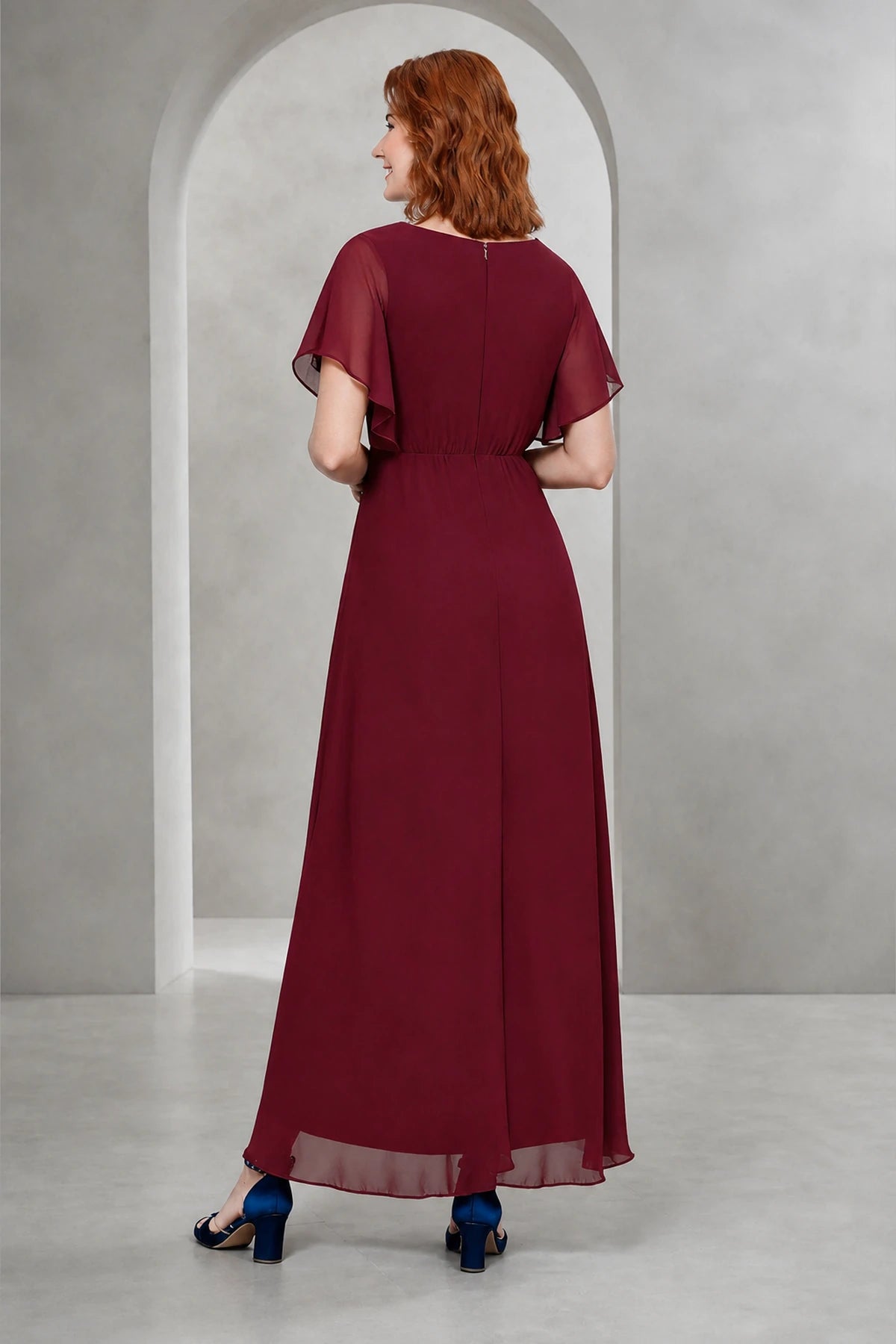 Burgundy A-line V-neck flutter sleeve long Mother of the Bride dress with beaded waist, asymmetric overlay and closed back, front and back view by Vedress