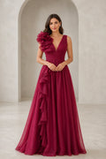Burgundy V-neck floor-length bridesmaid dress with statement shoulder ruffle and cascading drape