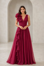 Burgundy V-neck floor-length bridesmaid dress with statement shoulder ruffle and cascading drape