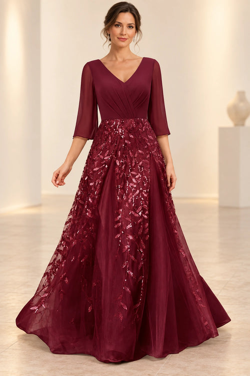 Burgundy mother of the bride dress with V neckline three quarter sleeves and sequin A line skirt