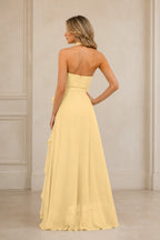 Butter yellow A-line V-neck halter bridesmaid dress with tie waist, high-low ruffle skirt and open back, front and back view by Vedress