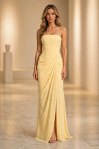 Butter yellow strapless floor-length bridesmaid dress with ruched waist and front slit
