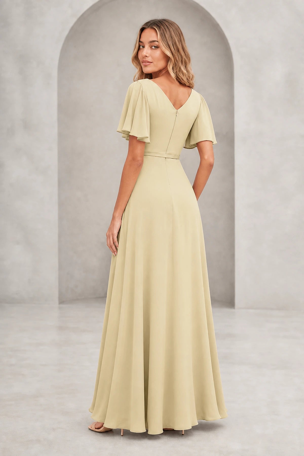 Vedress light champagne A-line mother of the bride dress with bateau neckline, flutter sleeves, waist tie, V-back and floor-length skirt
