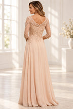 Back view of champagne blush Mother of the Bride Dress with V-back, lace detailing, center zipper and floor-length A-line skirt