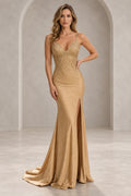 Champagne gold mermaid prom dress featuring a plunging V-neckline, spaghetti straps, sparkling beaded bodice, thigh-high slit, and floor-length sweep train by Graceprom.