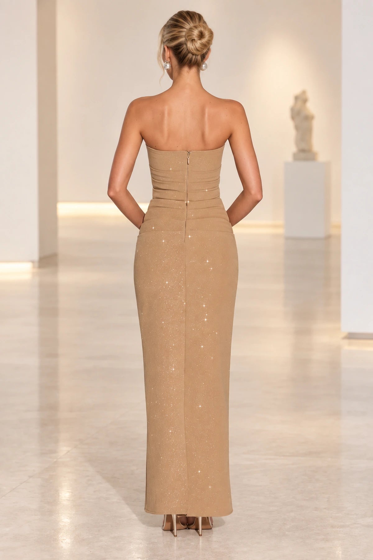 Champagne gold formal gown with zipper back and glitter fabric detail