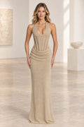 Champagne halter mermaid evening dress with fitted silhouette and textured bodice