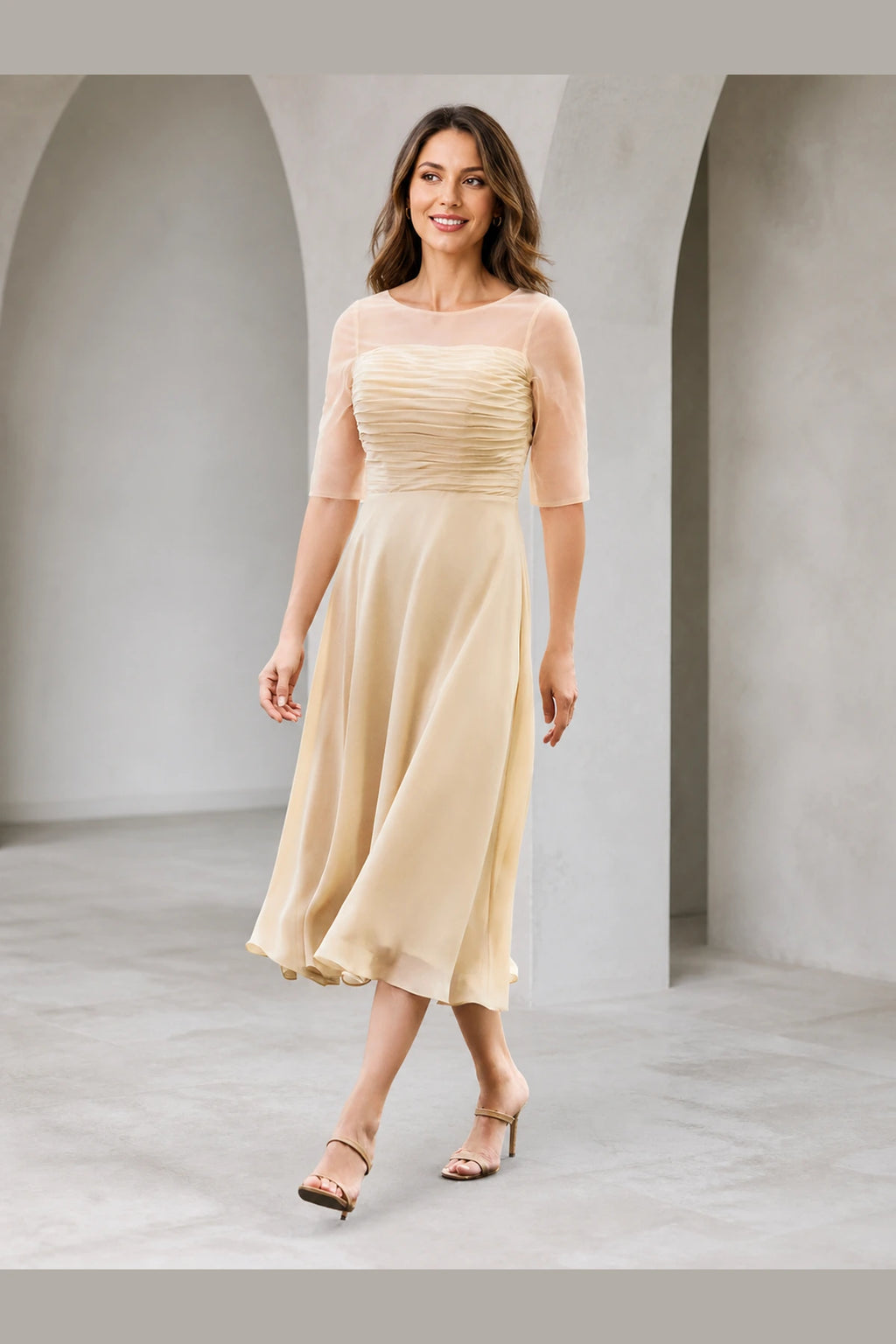 Vedress champagne A-line mother of the bride dress with illusion bateau neckline elbow sleeves ruched bodice and tea-length skirt front view