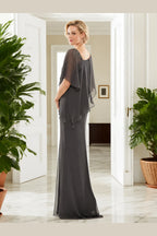 Charcoal gray mother of the bride dress with asymmetric neckline, sheer cape sleeves, beaded shoulder detail and floor-length silhouette, front and back view