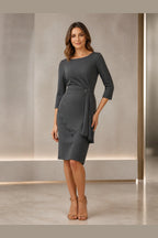 Charcoal gray sheath Mother of the Bride Dress with bateau neckline, three-quarter sleeves and asymmetric draped waist front view