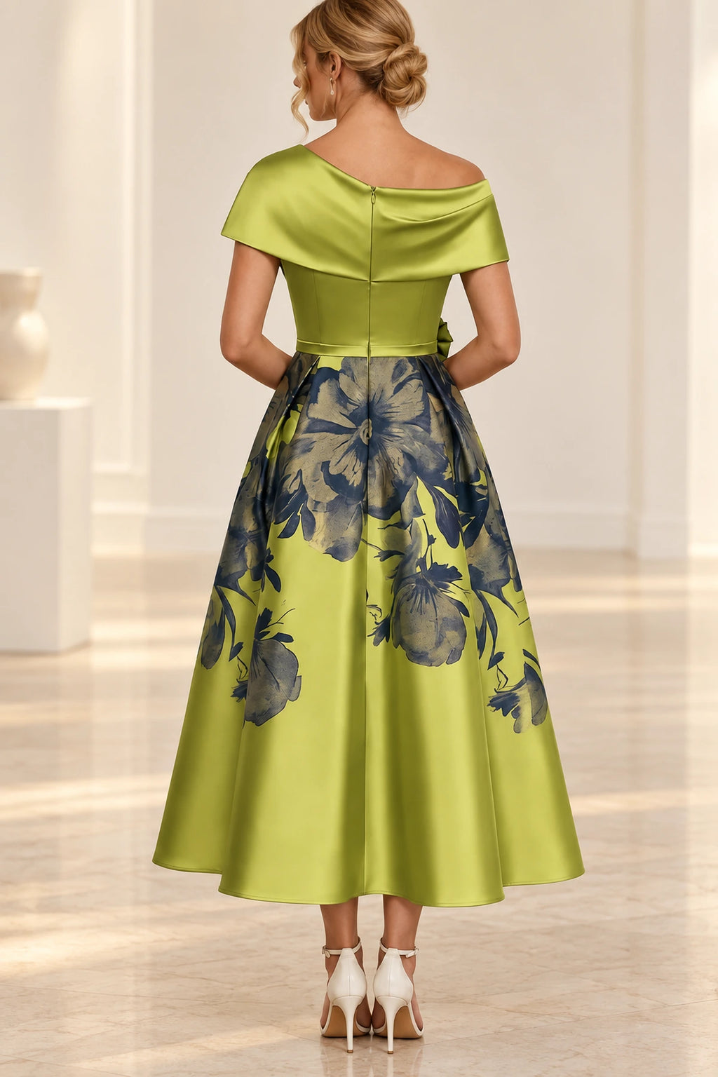 Back view of chartreuse green Mother of the Bride Dress with asymmetric neckline, center zipper and ankle-length floral A-line skirt